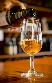 Pouring wine at Monichino Wines, Goulburn Valley Victoria, The Murray